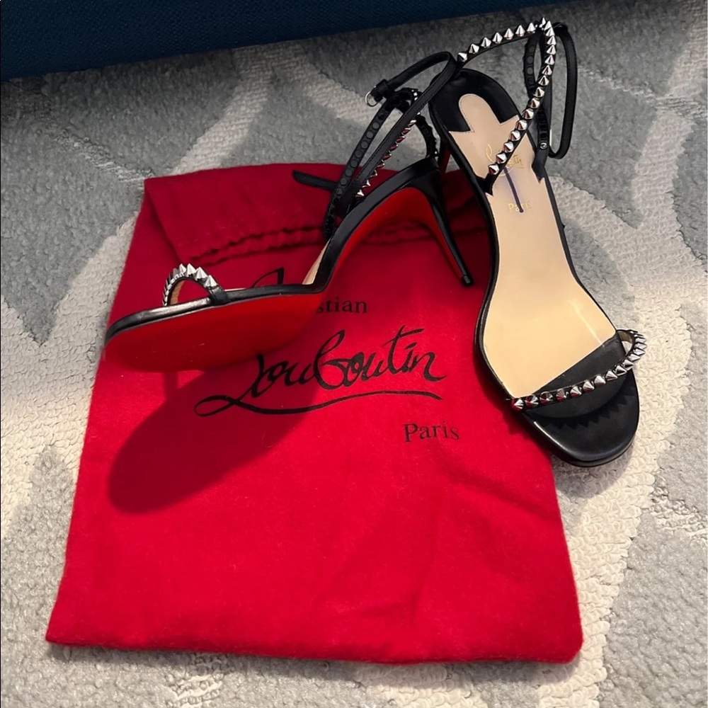 Christian Louboutin
So Me Spike Leather Sandals
